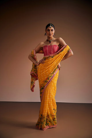 Yellow Printed Saree With Pink Corset