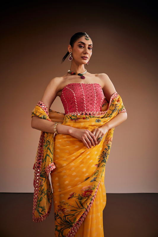 Yellow Printed Saree With Pink Corset