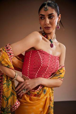 Yellow Printed Saree With Pink Corset