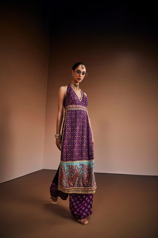 Deep purple halter neck kurta paired with palazzo pants