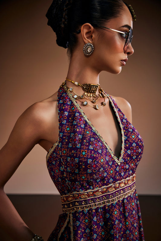 Deep purple halter neck kurta paired with palazzo pants