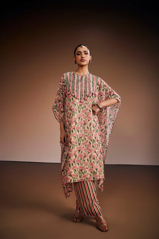 Floral printed kurta paired with striped pants and delicate heart shape tassels.